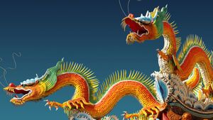 Jahr des Drachen symbolisiert durch zwei bunte Drachenfiguren