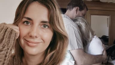 Anna Heiser blickt in die Kamera, im Hintergrund heult sie sich in Geralds Armen aus