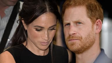 Herzogin Meghan sieht zu Boden, Prinz Harry sieht nachdenklich aus