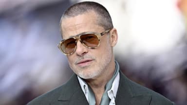 Brad Pitt mit kurzen Haaren und Sonnenbrille