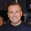Tim Raue strahlt
