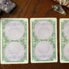 Drei umgedrehte Tarotkarten aus dem Kartendeck Ätherische Visionen