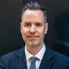 Christian Dürr lächelt leicht