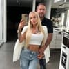 Vanessa Louis und Dennis Kessmeyer vor einem Spiegel