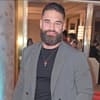 Aleks Petrovic lächelt bei den Reality TV Awards