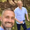 Jens Spahn mit Mann und Kinderwagen