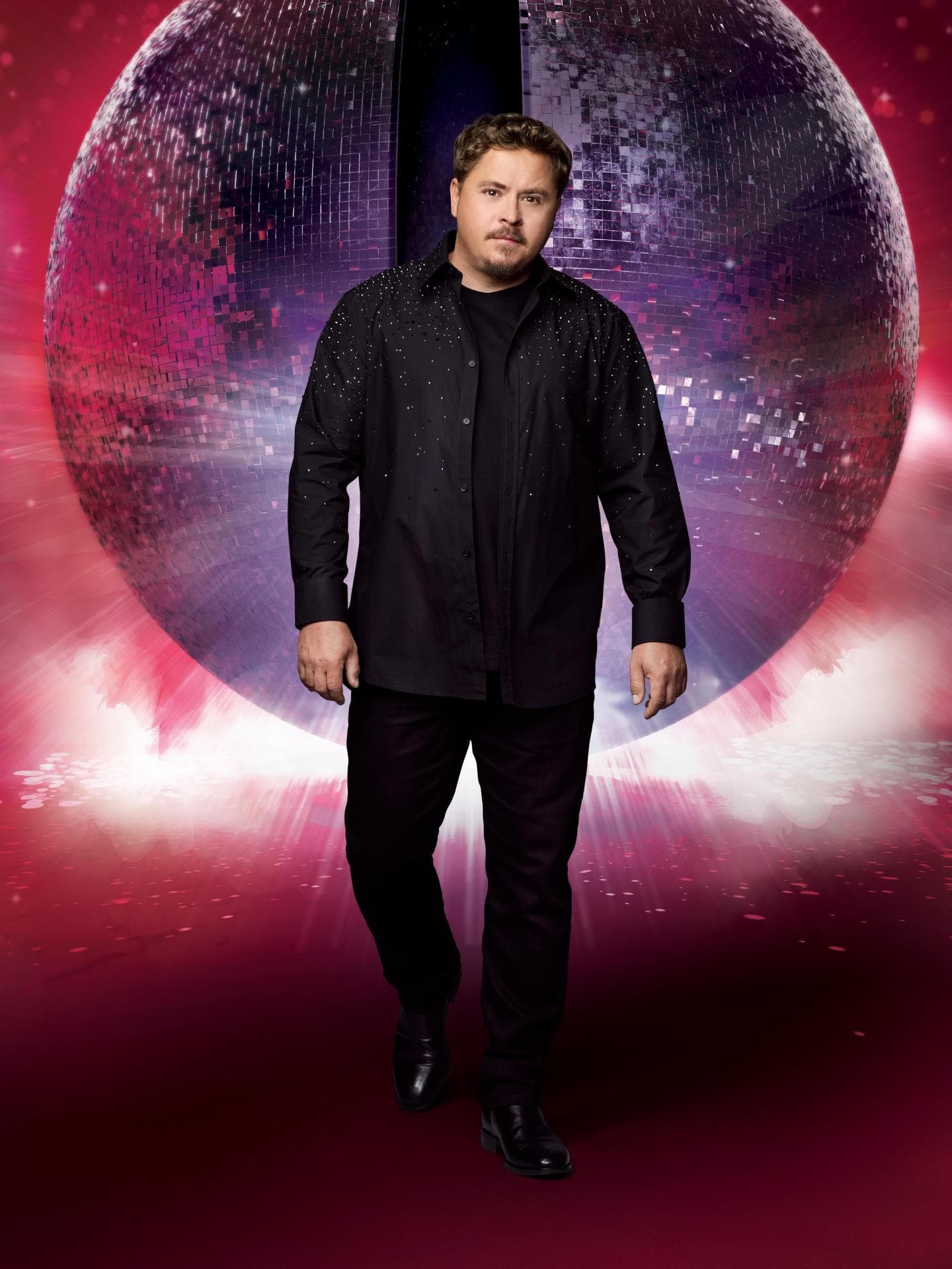 Gustav Schäfer vor Discokugel