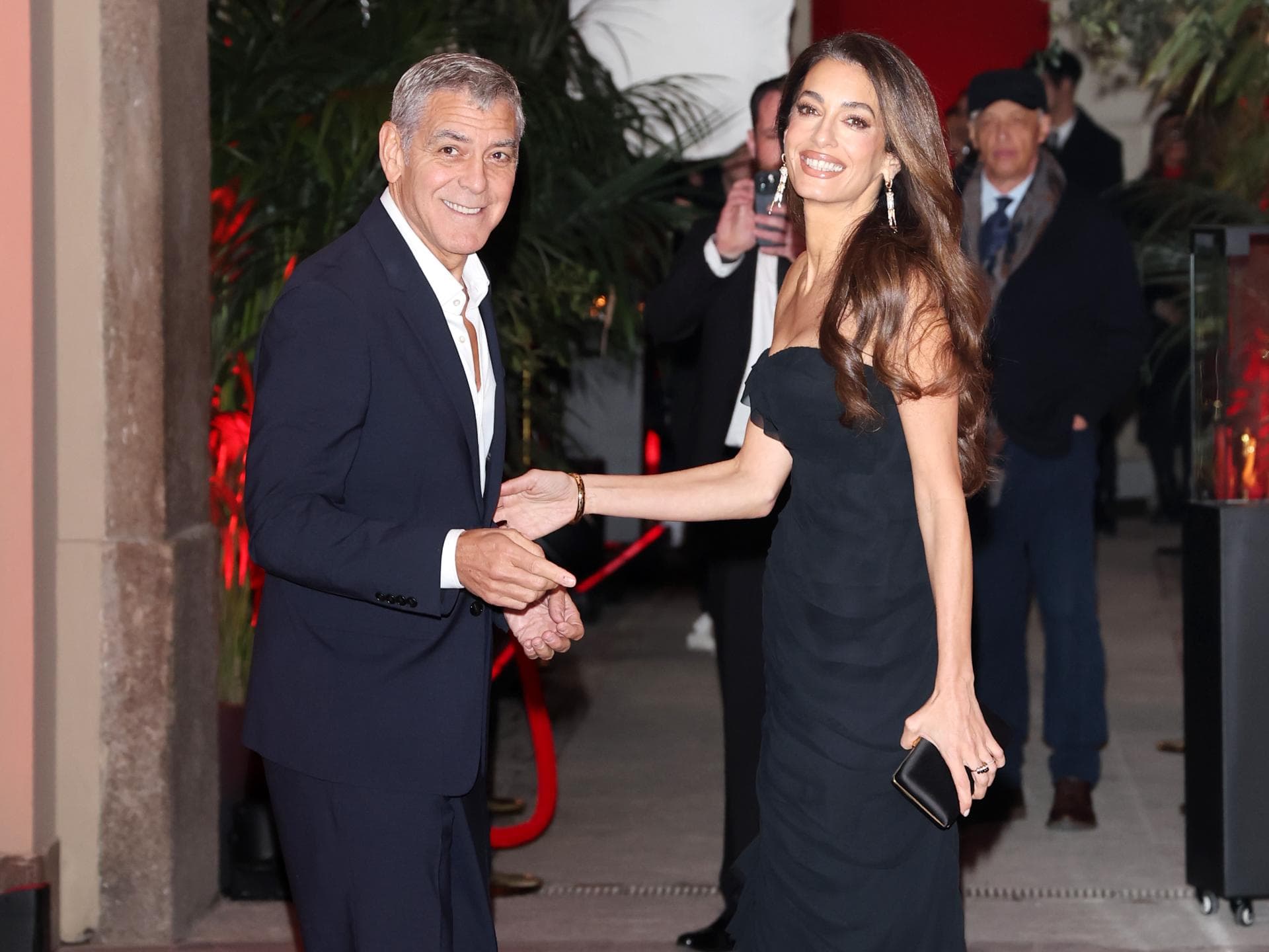 George Clooney und Amal bei Opening night im OMEGA House im Rahmen der Olympischen Spiele