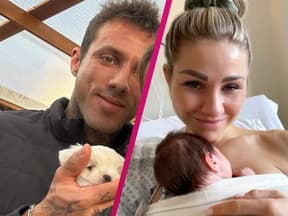Christian Wolf und Antonia Elena mit Baby im Arm