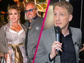 Carmen und Robert Geiss lächeln, Oliver Pocher mit Mikrofon guckt ernst