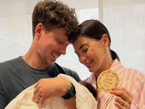 Rena und Valentin Lusin mit Baby Tessa