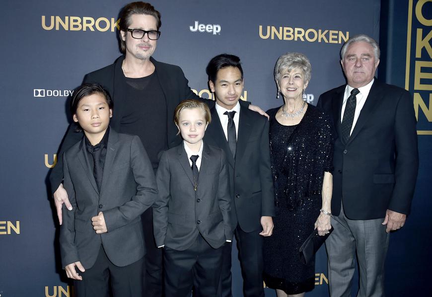 Brad Pitt zusammen mit seinen drei Kids Maddox, Pax und Shiloh bei der
