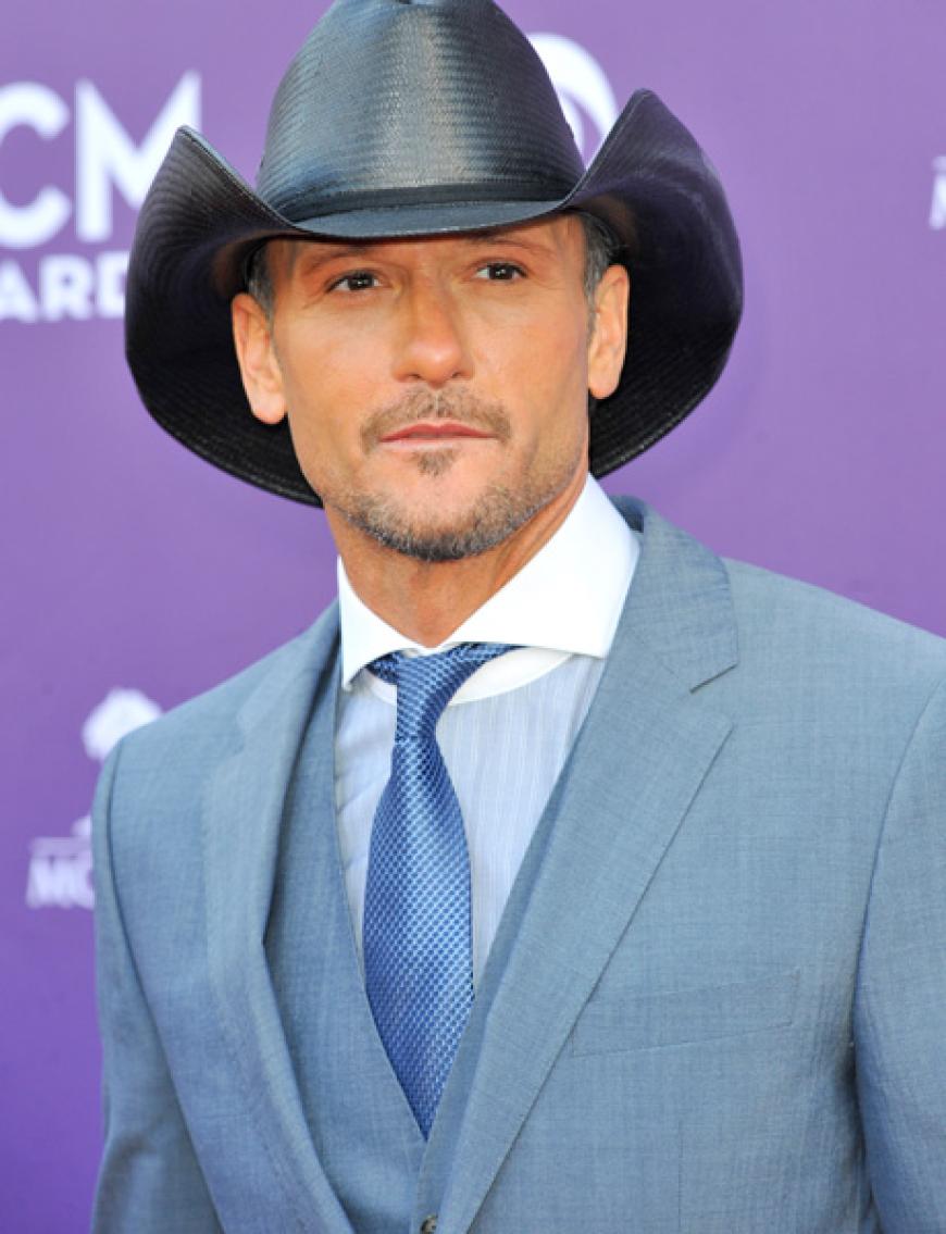 Ihr Ehemann Tim McGraw mag es lieber schlicht - aber der Cowboyhut darf natürlich nicht fehlen. Standesgemäß!