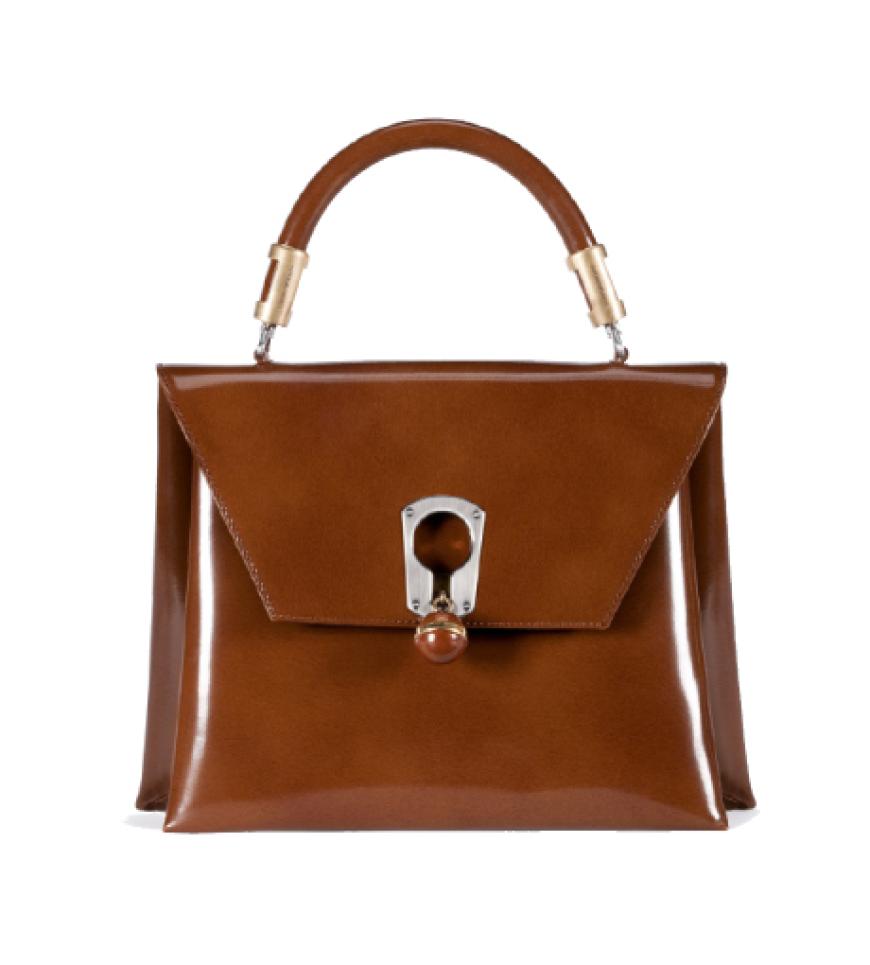 Designer wie Marc Jacobs oder Muicca Prada ließen sich von den 50er- und 60er-Jahren inspirieren und zeigen uns die neue Weiblichkeit mit schwingenden Röcken, betonten Taillen und modernen Interpretationen der Schnitte. Glänzendes Leder mit Kugelverschluss von Emporio Armani, ca. 380 Euro