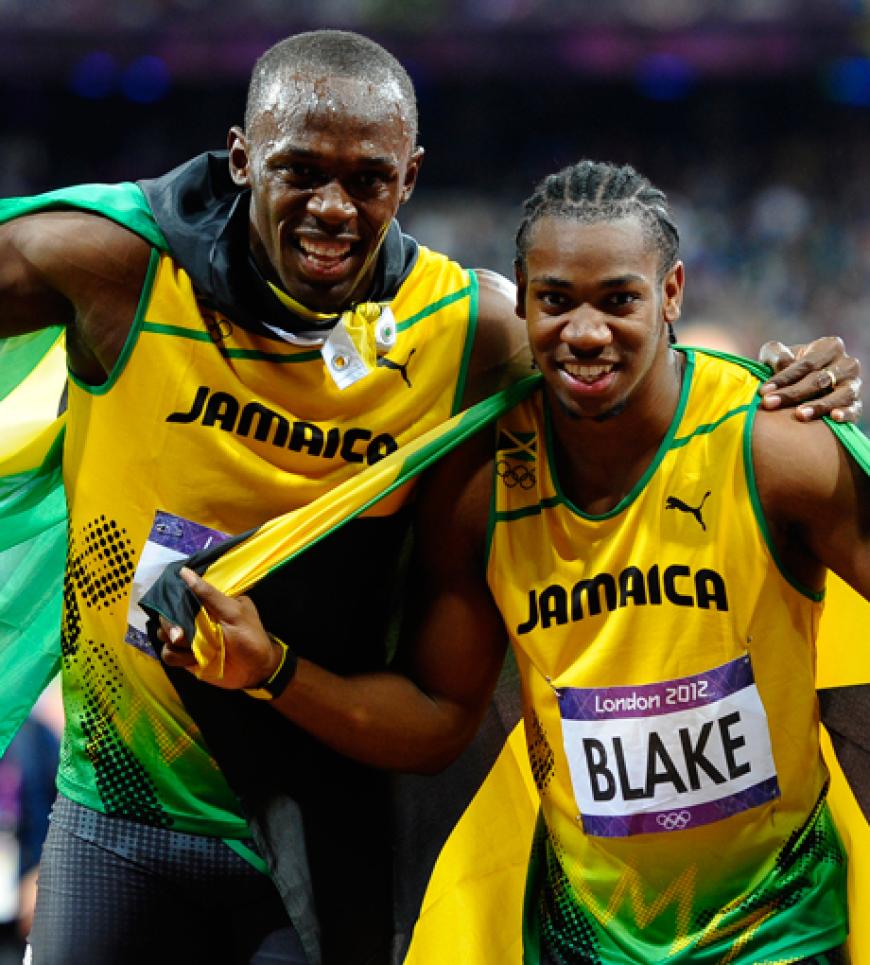 Nur sein Landsmann Usain Bolt ist noch schneller und freut sich zusammen mit dem 22-Jährigen über die Medaillen