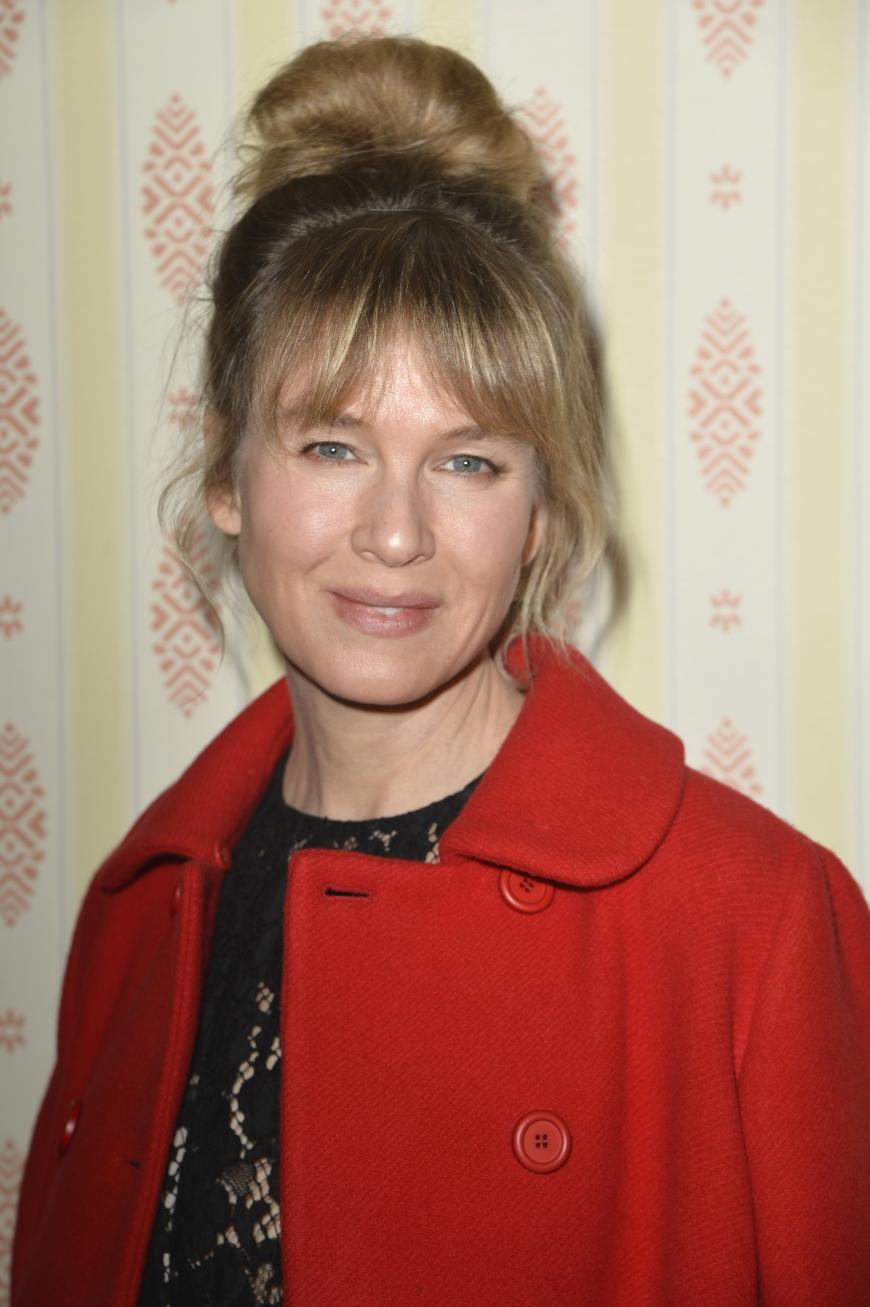 Überraschte auf der Pariser Fashion Week: Renée Zellweger sieht wieder wesentlich natürlicher aus.