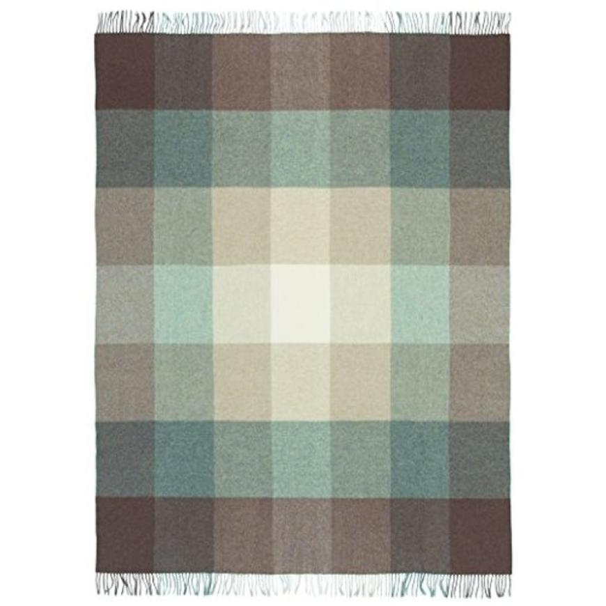 Karierte Decke in Creme und Türkistönen von Filz-Cut via Amazon, ca. 170 Euro.