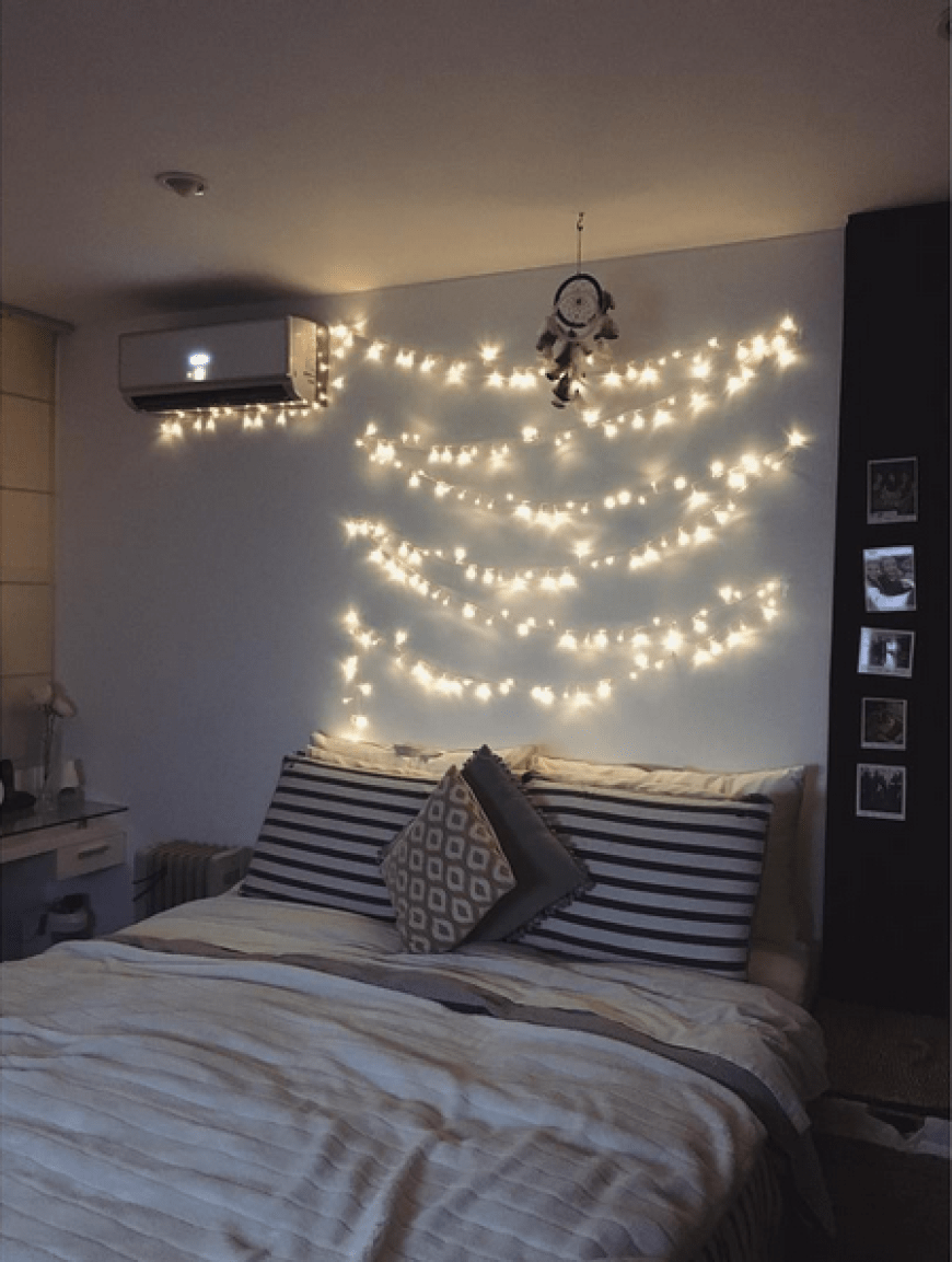 Lichterketten versprühen Wohlfühlflair im Schlafzimmer.