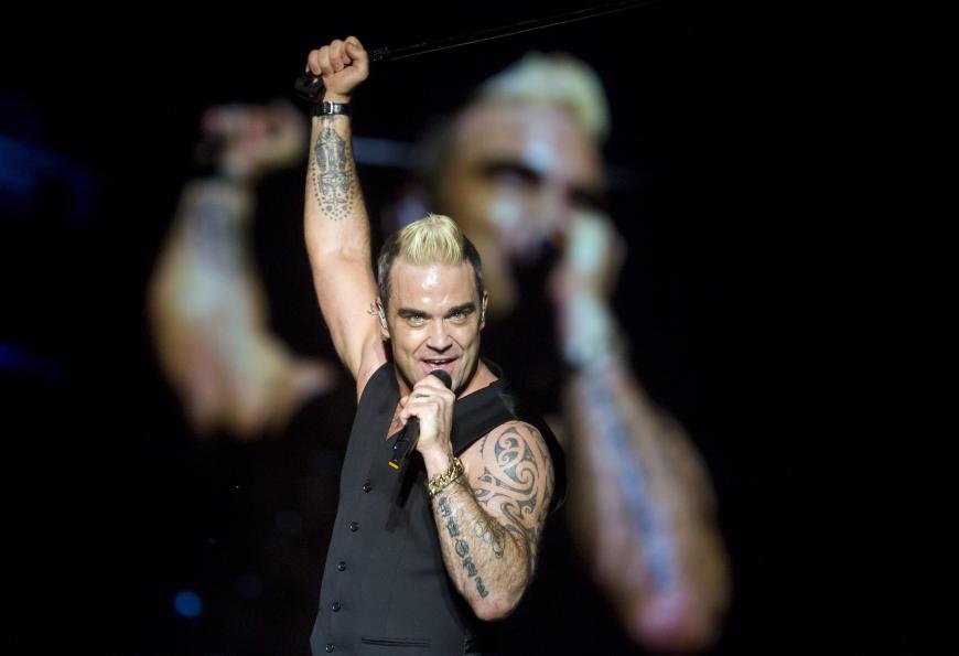 Robbie Williams ist bekannt für seine wilden Tätowierungen.