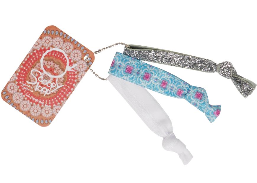 GUTE BINDUNG „Luxe Grunge“-Haarbänder von Scoopy loop, bunt und haarschonend, ca. 14 Euro, scoopy-loop.com