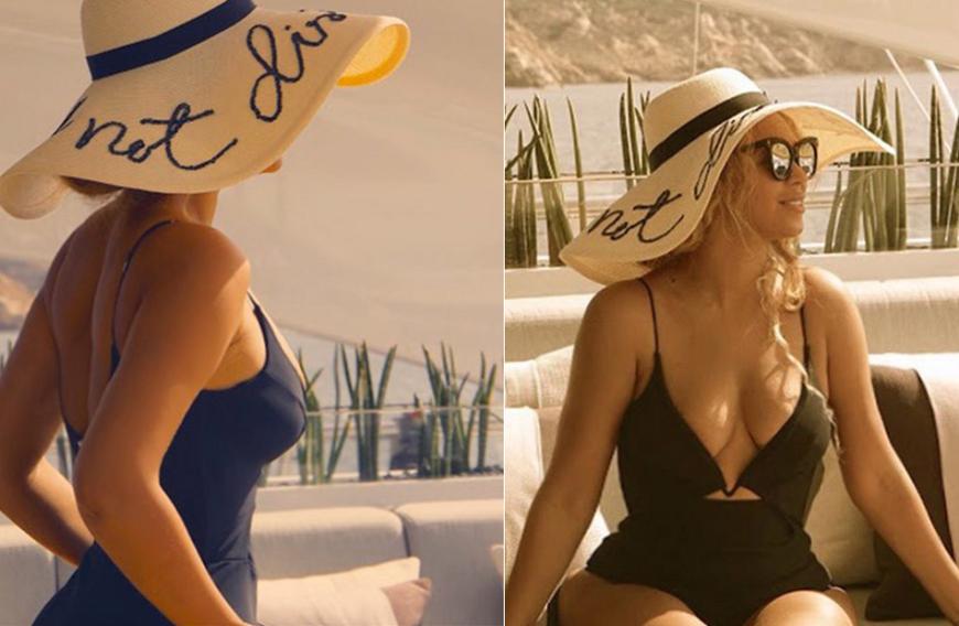 Beyoncé genießt die Sonne in einem tiefausgeschnittenen One Piece in schwarz.