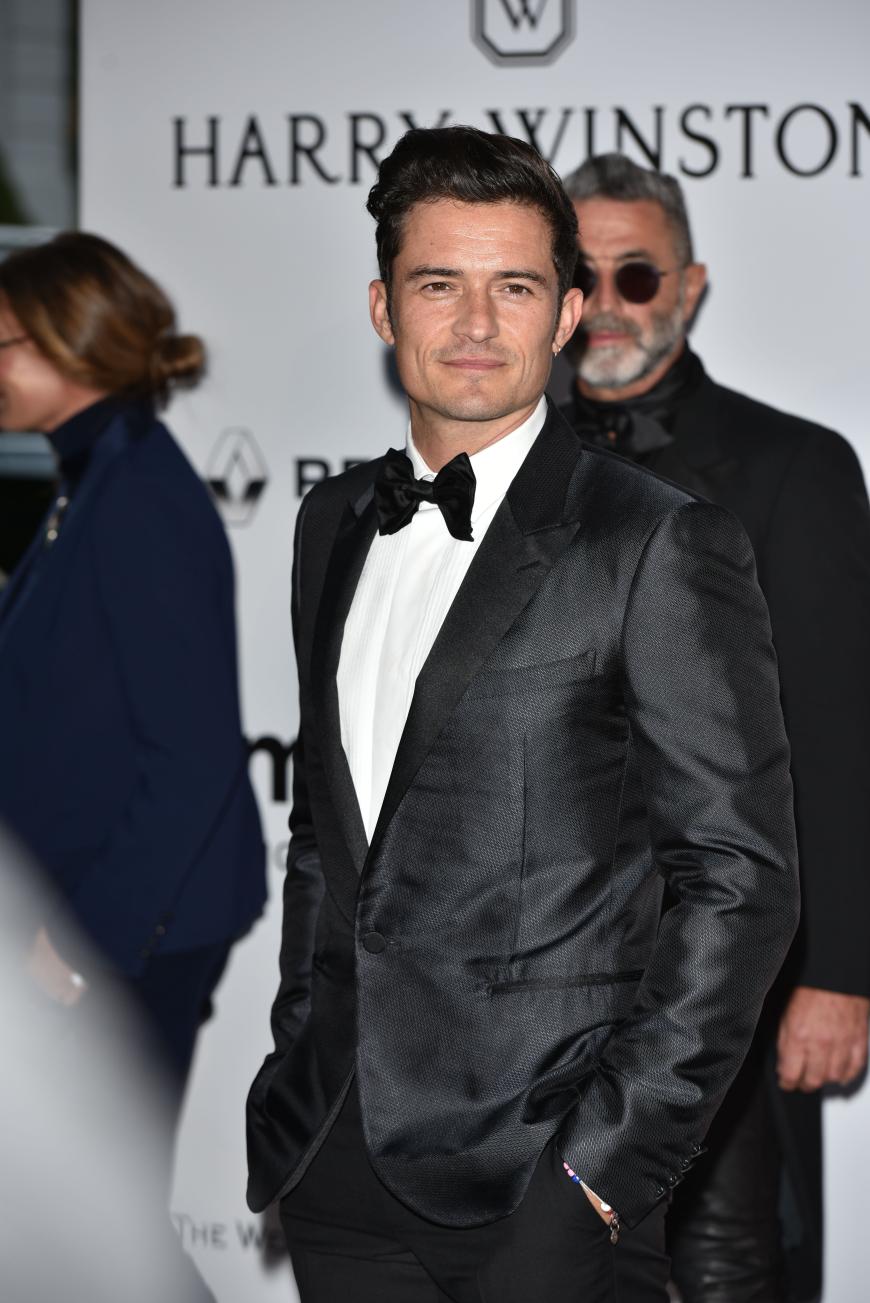Logisch, dass auch ihr Liebster Orlando Bloom mitziehen muss: Der Schauspieler kam - wie sollte es auch anders sein - als Bill Clinton.
