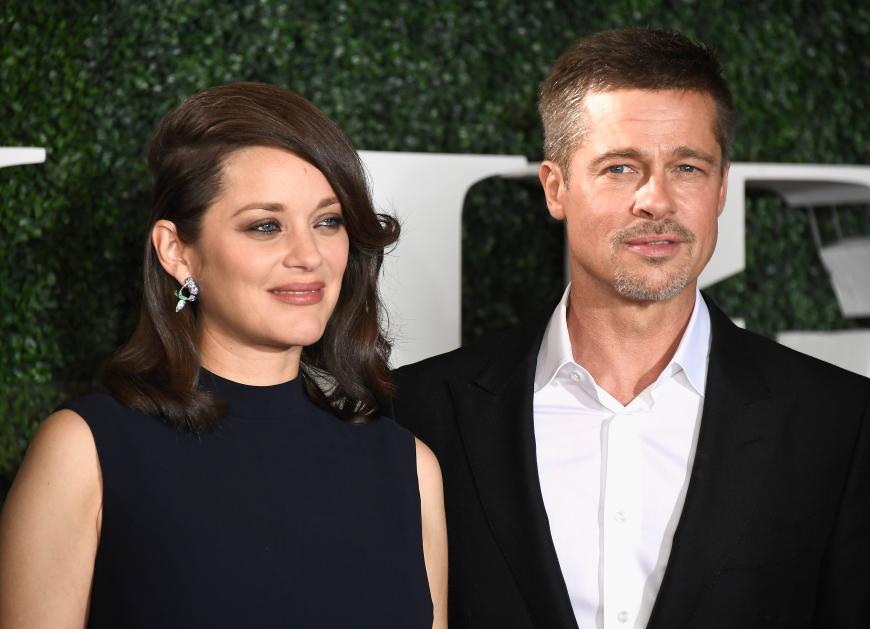 Brad Pitt (hier mit Filmpartnerin Marion Cotillard) scheint der Scheidungskrieg weniger mitzunehmen als seine Ex.