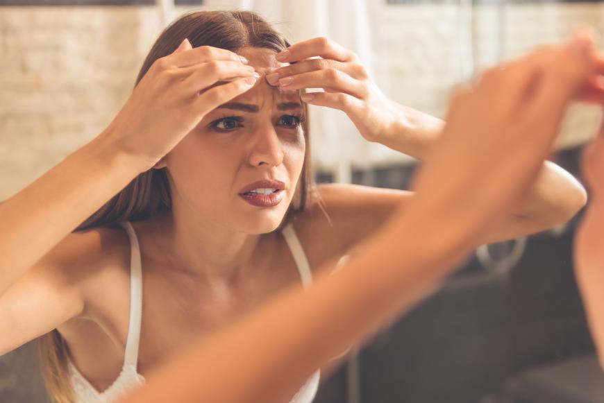 Stress führt bei vielen Menschen zu Pickeln.