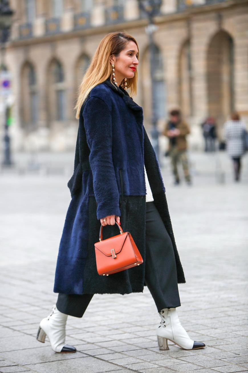 Orange is the new Black! Knallige Taschen und Fellmäntel im Krümelmonster-Style solltet ihr auch außerhalb von Paris im Schrank haben.