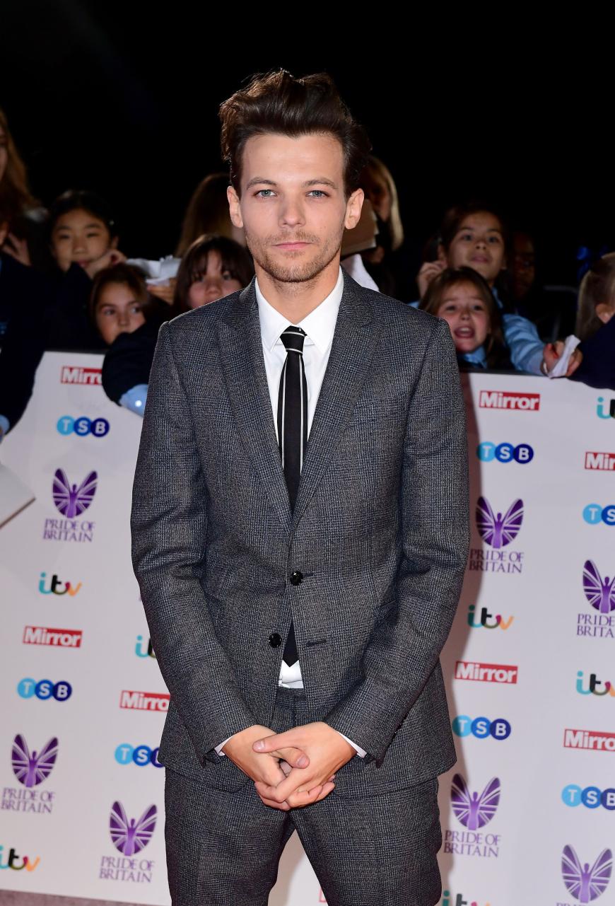 Louis Tomlinson rastete am Flughafen von Los Angeles aus und ging auf einen Paparazzo los.