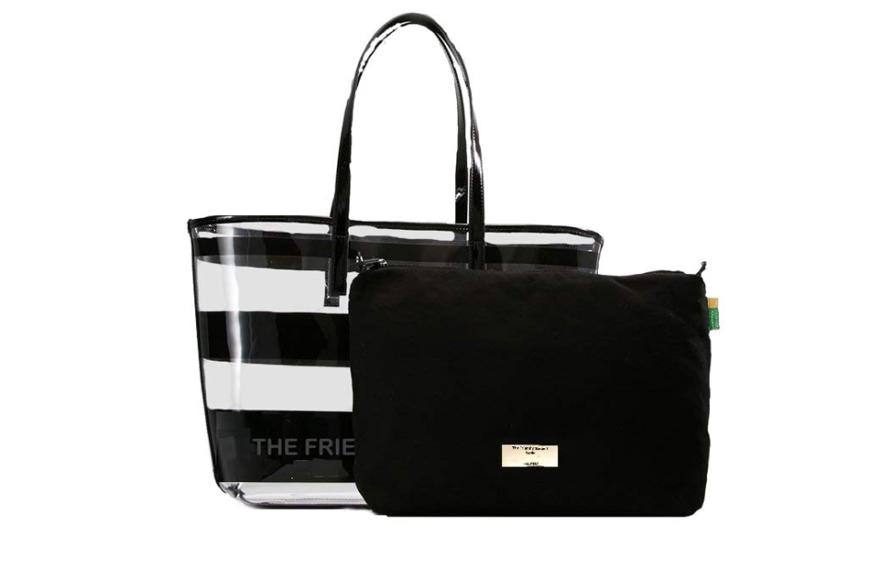Diese stylische Handtasche mit schwarzen Akzenten von The Friendly Student kommt mit einer praktischen Innentasche aus Velours. Sie bietet genug Platz für Laptop und Bücher und kann somit problemlos für die Uni oder das Office genutzt werden. Hier kannst du das IT-Piece für ca. 35 Euro shoppen.
