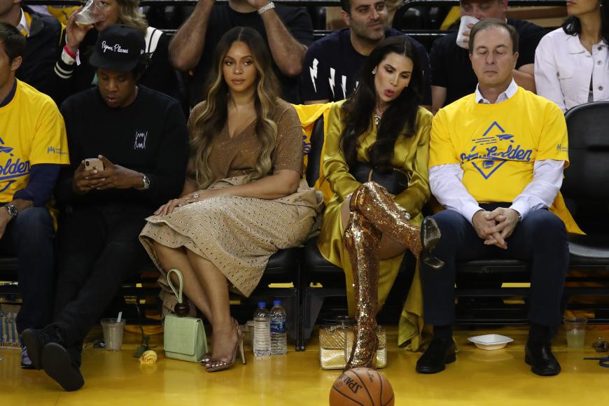 Die Stimmung ist mehr als frostig: Beyoncé Knowles neben ihrem Mann Jay Z und Nicole Curran, die zuvor Beys Ärger auf sich gezogen zu haben schien.