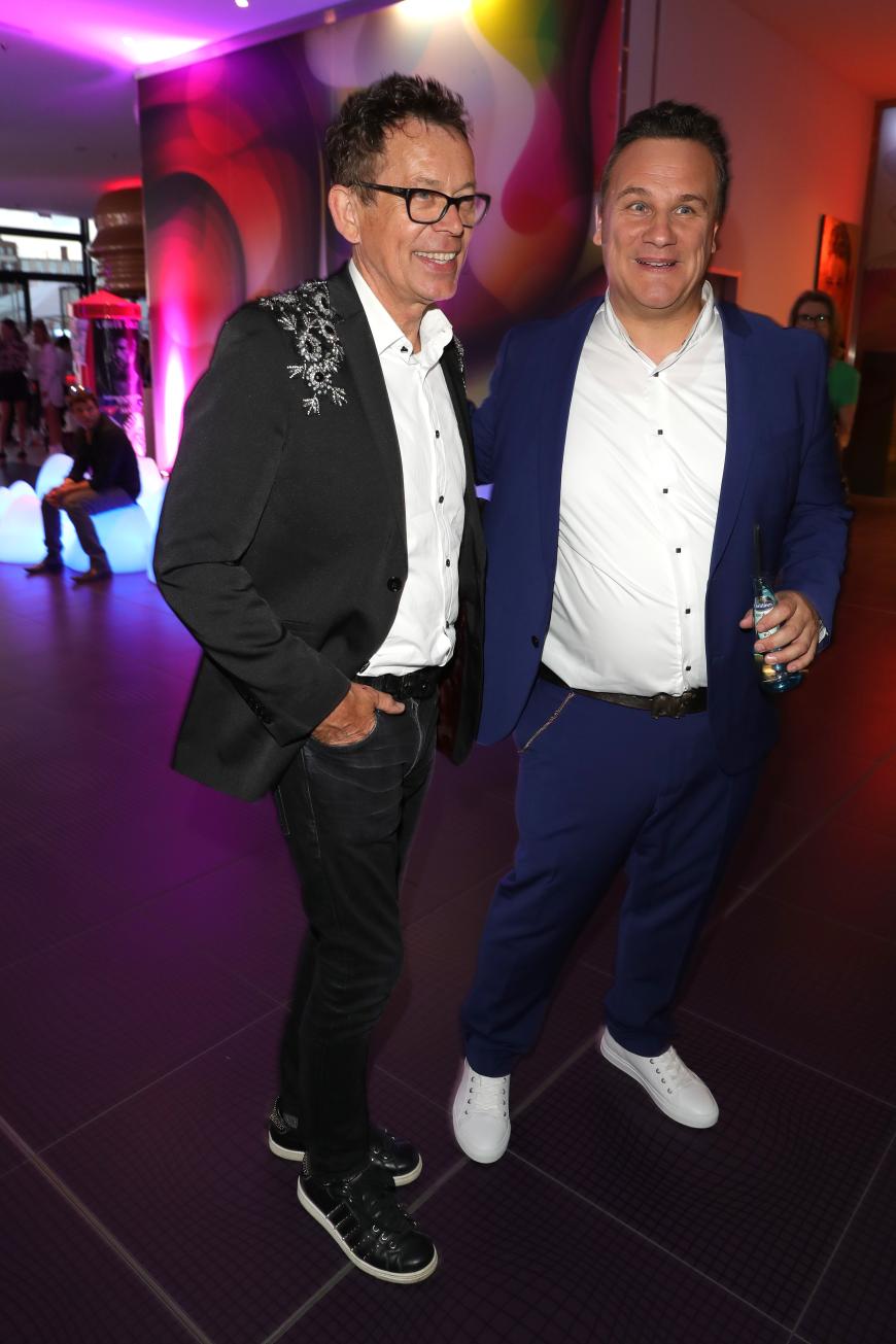Designer Guido Maria Kretscher mit seinem Mann Frank Mutters