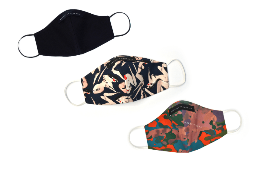 Die deutsche Designbrand Marcell von Berlin produziert im eigenen Atelier in Berlin Gesichtsmasken aus aktuellen und vergangenen Kollektionsstoffen zum Preis von je 7 Euro. Die Masken in verschiedenen Designs kannst du hier im eigenen Onlineshop kaufen.