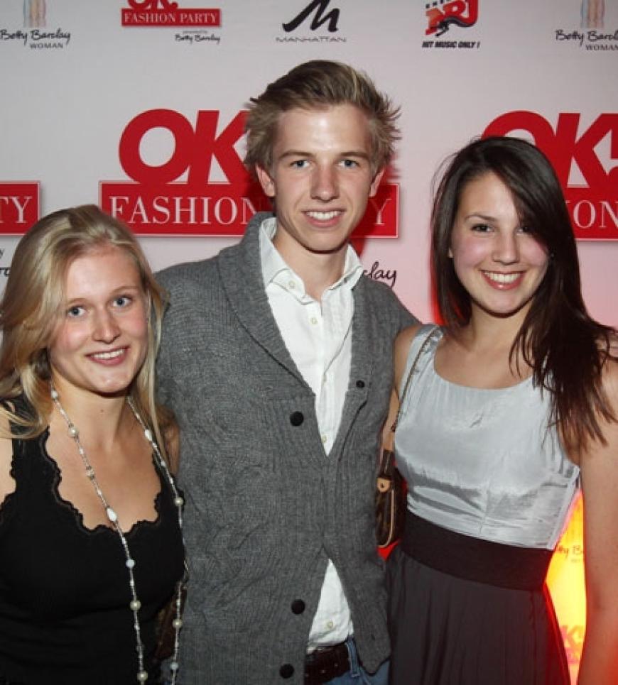 Hahn im Korb: Ein OK! Fashion Party-Gast mit seiner charmanten Begleitung