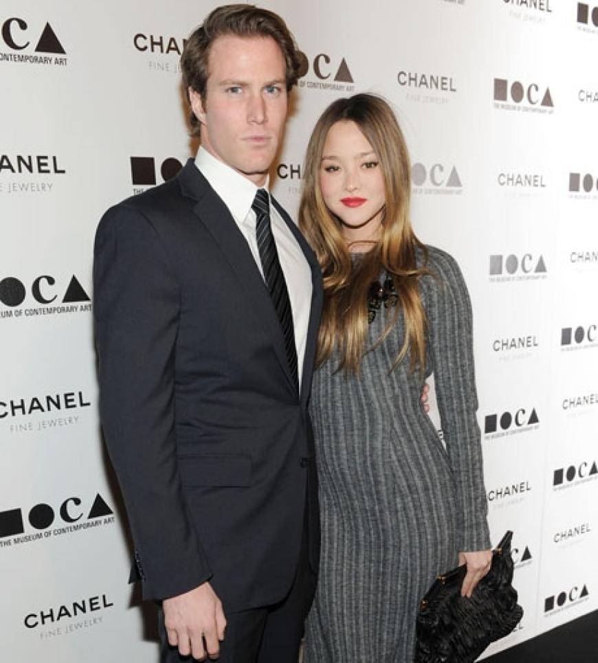 Schauspielerin und Model Devon Aoki mit Freund