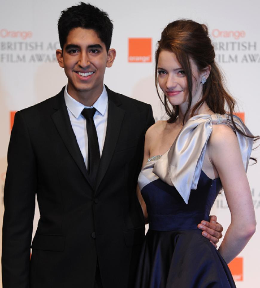 Der indische Schauspieler Dev Patel posiert mit Talulah Riley