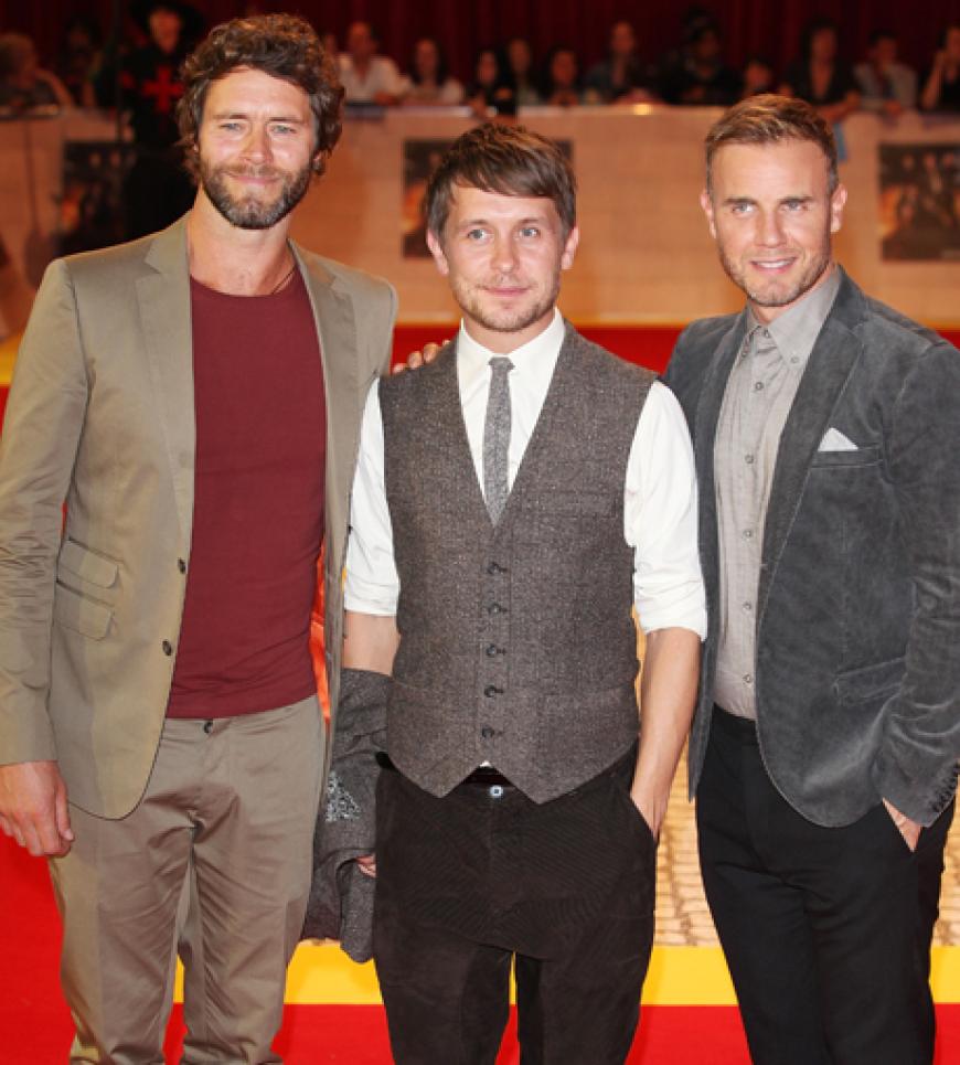 Howard Donald, Mark Owen, Gary Barlow sorgten mindestens für genauso viel Blitzlichtgewitter wie die Hauptdarsteller des Films. Die Band lieferte übrigens den Soundtrack zum Film