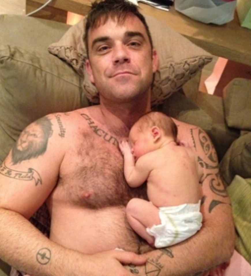 Robbie Williams' Körper schmücken zahlreiche Tattoos. Sein nächstes soll Töchterchen Theodora