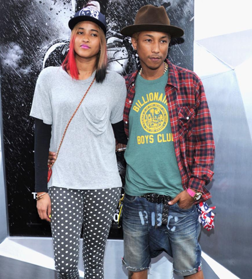 Pharrell Williams mit Begleitung