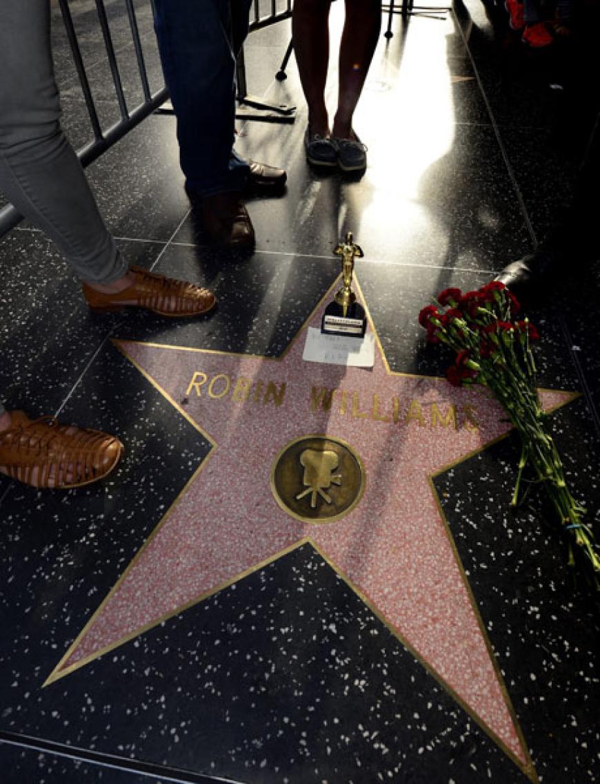 Trauer und Anteilnahme: Fans legen Blumen auf Williams' Stern auf dem