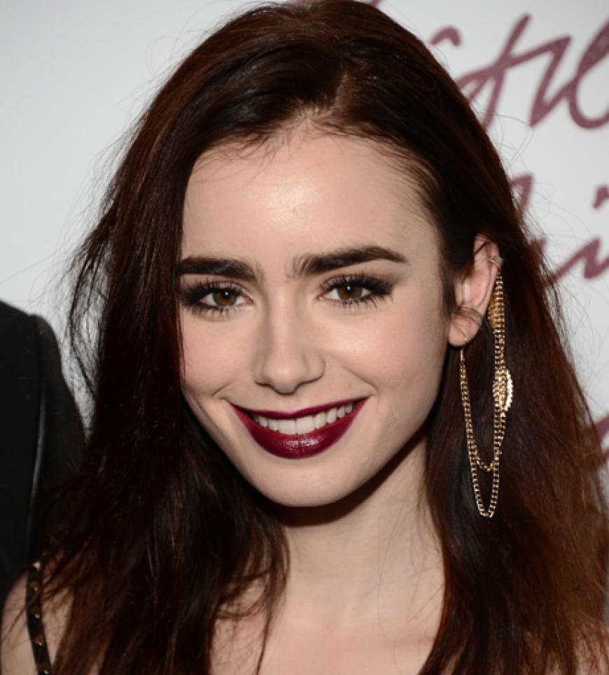 Düster: Schauspielerin Lilly Collins strahlte in die Kameras