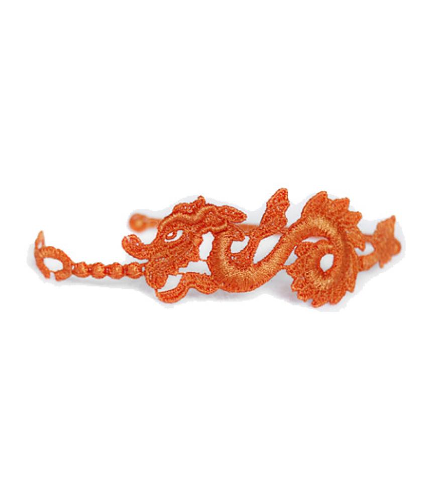 16. August 2012: Soll Glück bringen: Geknüpftes Armband mit chinesischem Drachen von Cruciani, ca. 15 Euro