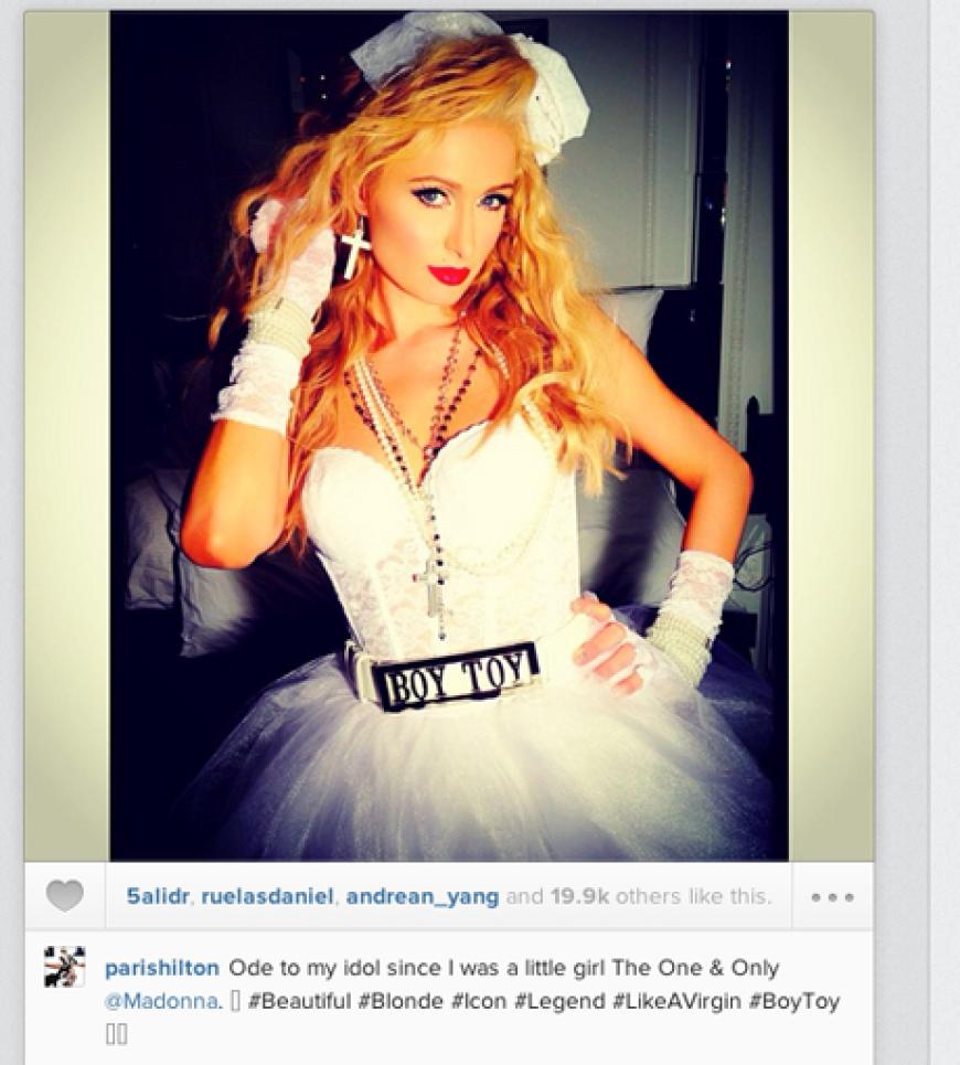 Paris Hilton schlüpfte Halloween 2013 in diverse Outfits. Hier macht sie einen auf Madonna in den 80ern
