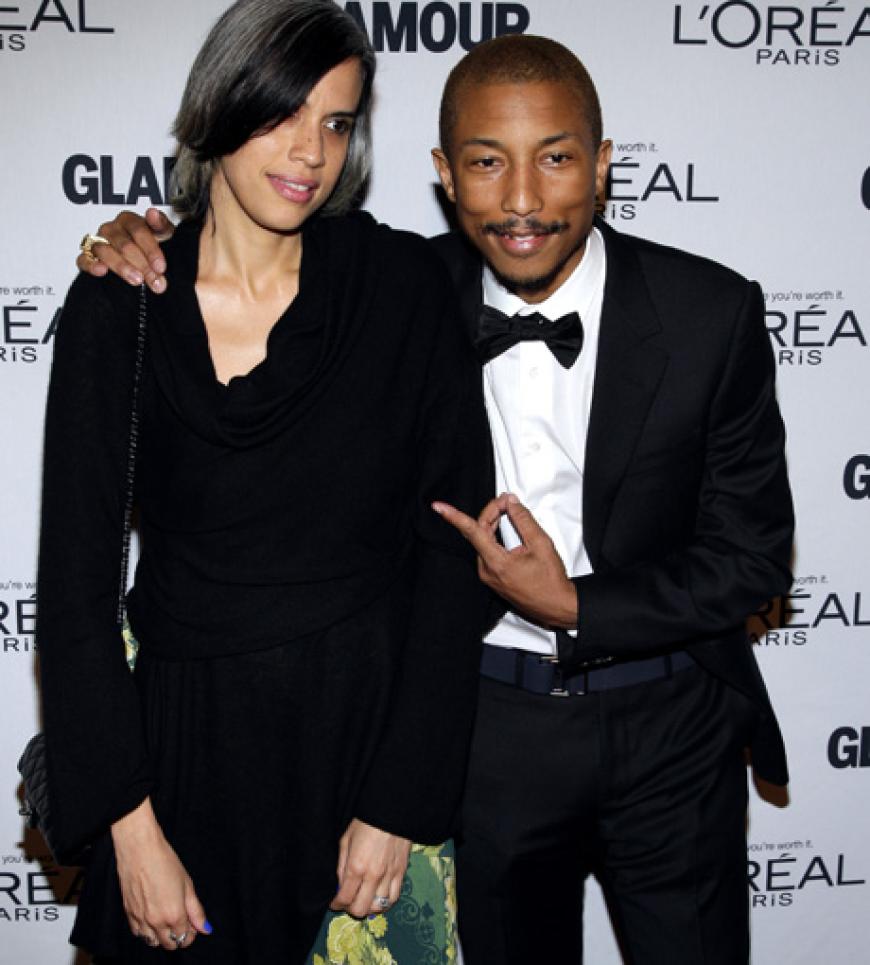 Pharrell Williams mit Begleitung