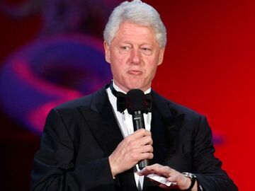Bill Clinton spricht zum Publikum, seine Stiftung betreibt ein großes Aidsprogramm