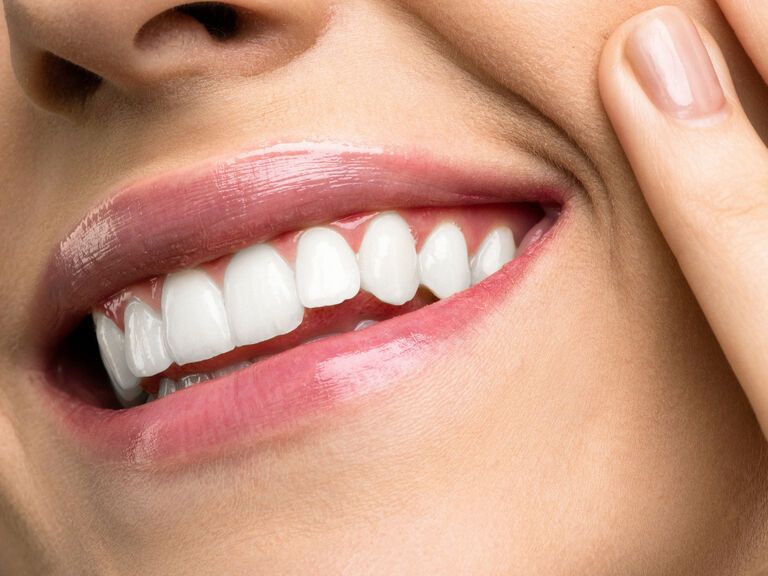 Weiße Zähne lächeln