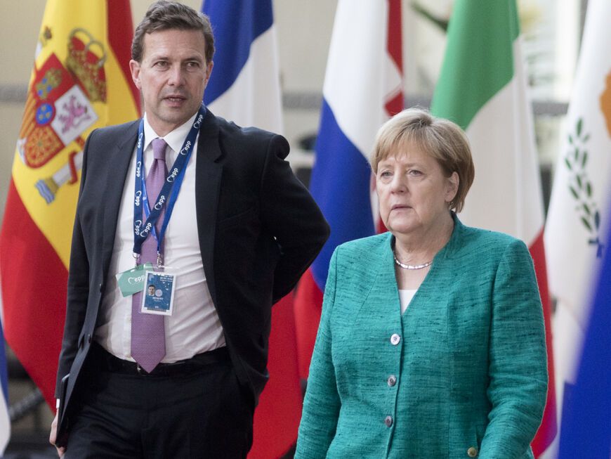 Steffen Seibert und Angela Merkel
