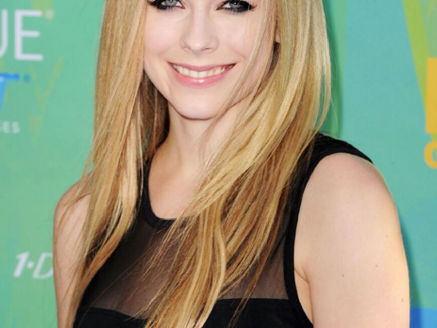 Frisch erholt aus dem Urlaub strahlte Sängerin Avril Lavigne in die Kameras