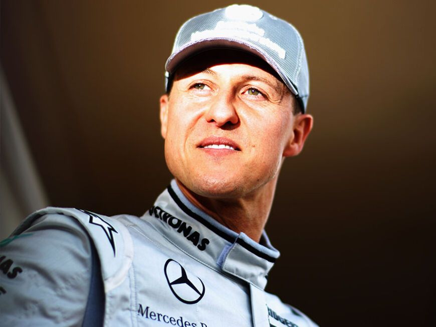 Michael Schumacher lächelt